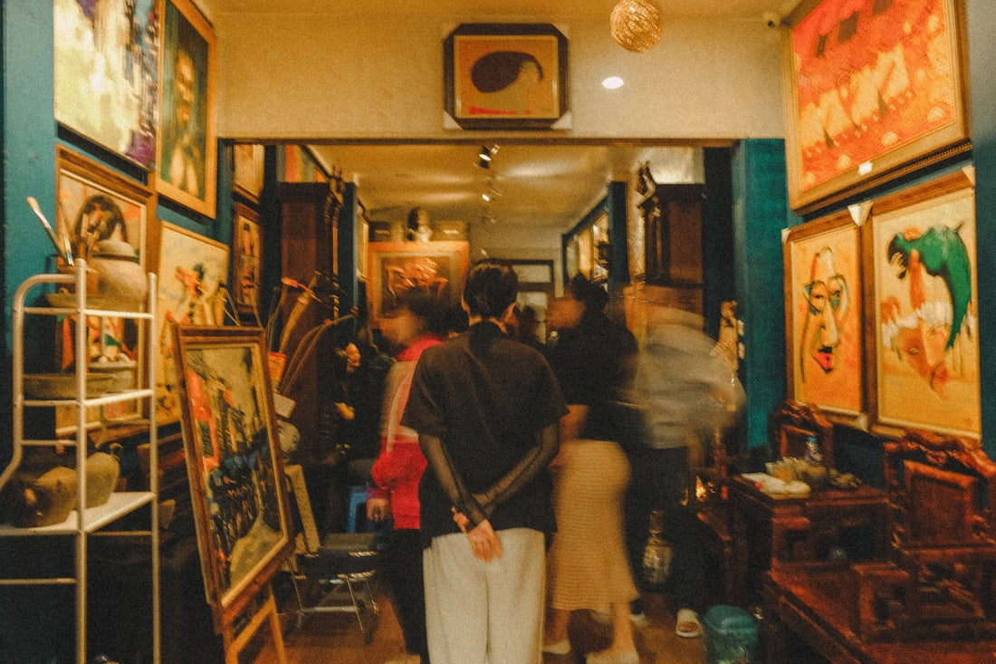 People browsing art in a gallery